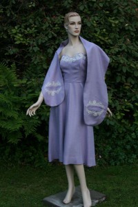     Very fine linen 1950s strapless dress with matching stole with fine embroidered detail